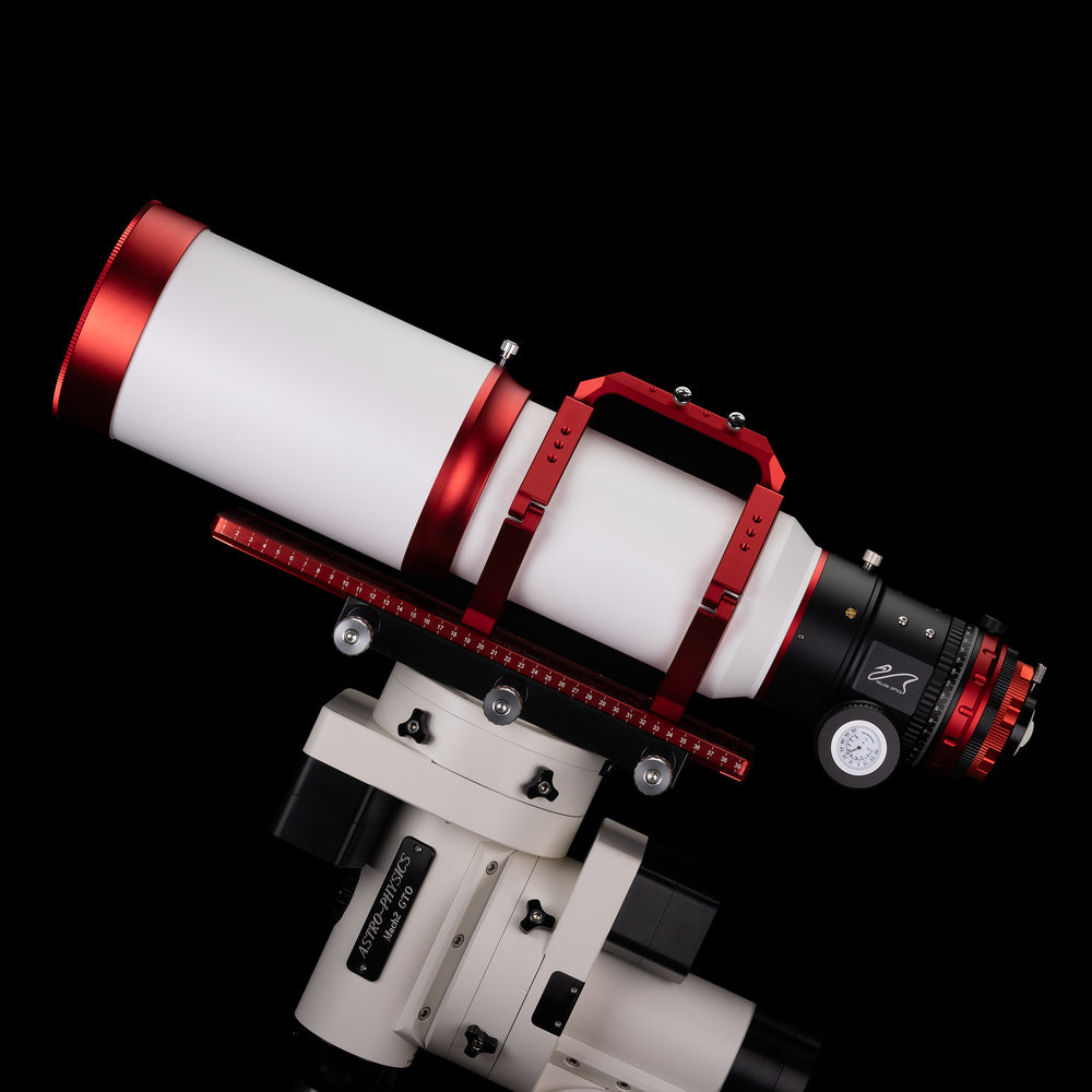 William Optics Fluorostar 120 telescope with silver tube and lens, set up outdoors for stargazing.
