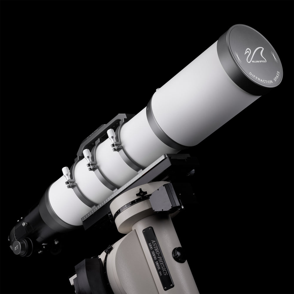 William Optics Fluorostar 156 telescope with sleek silver tube and adjustable focuser, ready for astronomical viewing.