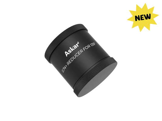 Askar 131F 0.74× reducer telescope accessory, showing the metallic optic component with threaded connections for astrophotography.