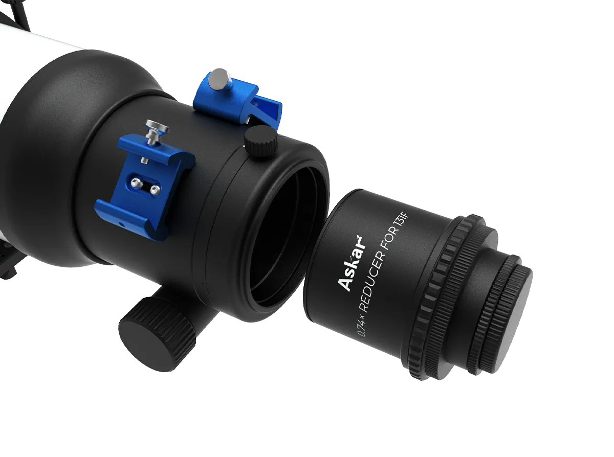 Askar 131F 0.74× telescope reducer adapter showing a metal cylindrical accessory with threaded ends for telescope attachment.
