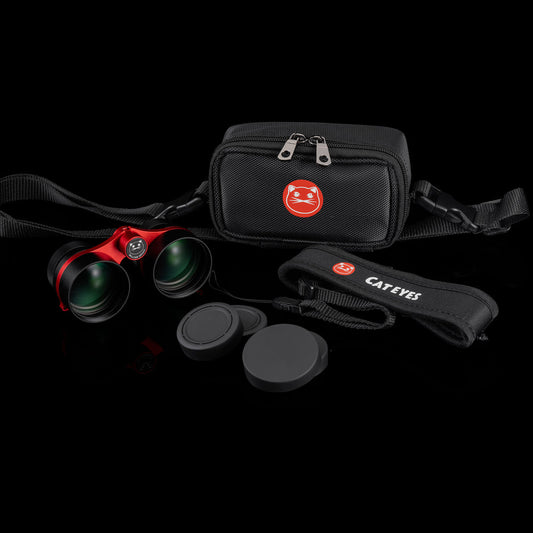 William Optics Cat Eyes binoculars showing close-up of objective lenses and sleek black design.
