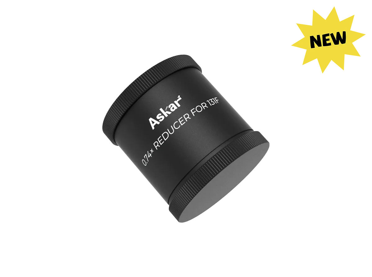 Askar 131F 0.74× reducer telescope accessory, showing the metallic optic component with threaded connections for astrophotography.