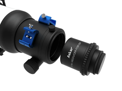 Askar 131F 0.74× telescope reducer adapter showing a metal cylindrical accessory with threaded ends for telescope attachment.